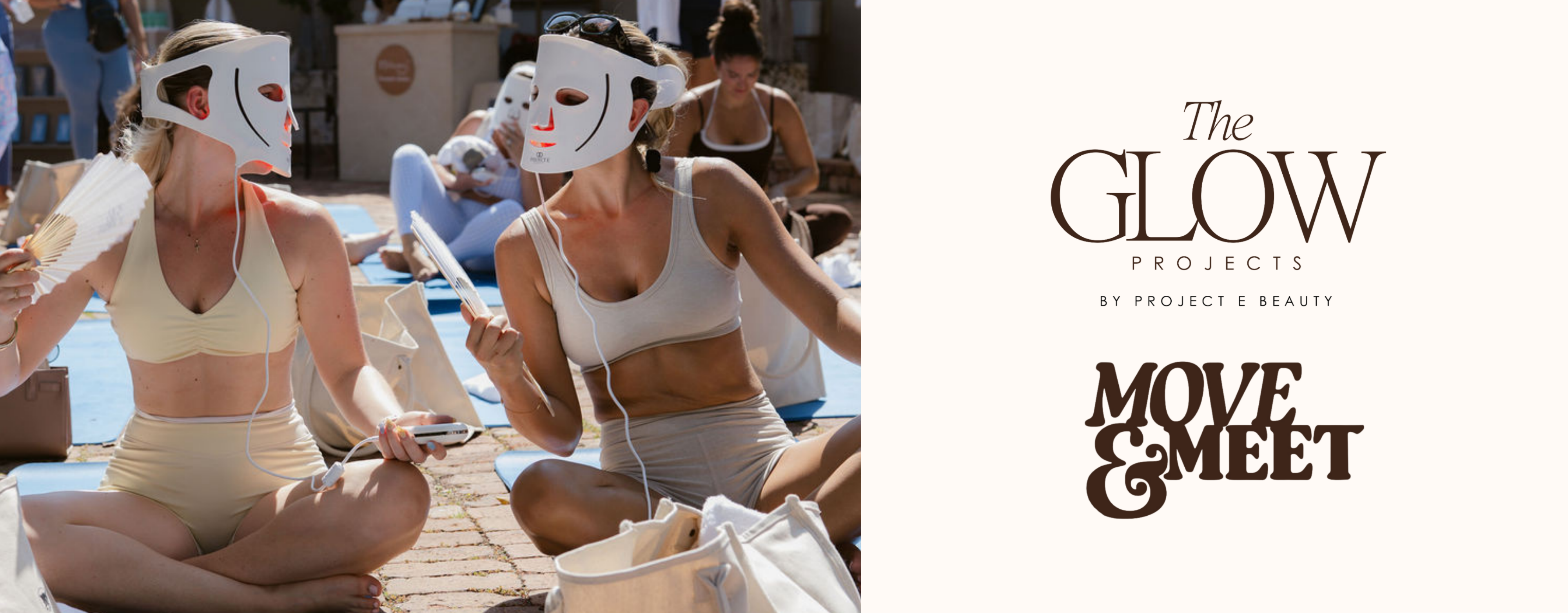 Group of women in LED light therapy masks seated on yoga mats at Project E Beauty Move & Meet outdoor event.